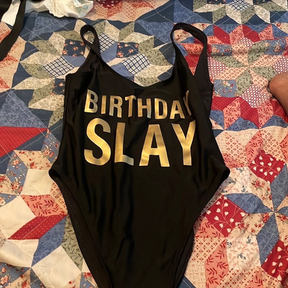 black and gold bathing suit brand new never been worn
